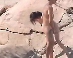 She found a cock handy the nude beach    And couldn't resist to try it!