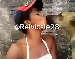 Beautiful Nigerian girl kisses will not hear of dog publicly