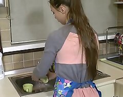 young wife in kitchen