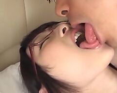Skinny Asian girl with glasses gets properly fucked in threesome
